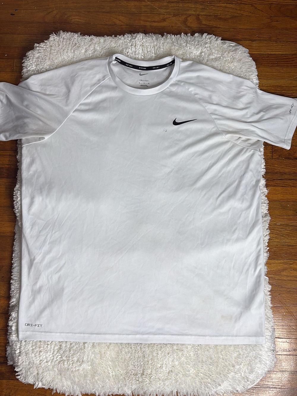 Nike White Short Sleeve Dri-FIT Tee with Black Swoosh